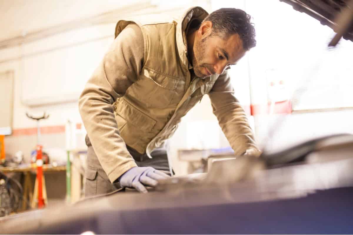 Man working on car Hobbies with Self Storage