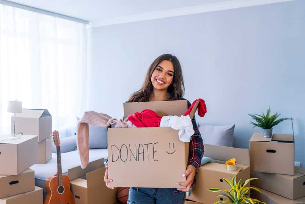 Woman Dontating Items Self Storage