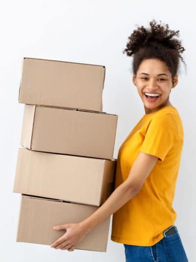 Self Storage Unit Size Guide Missouri Woman Holding Boxes